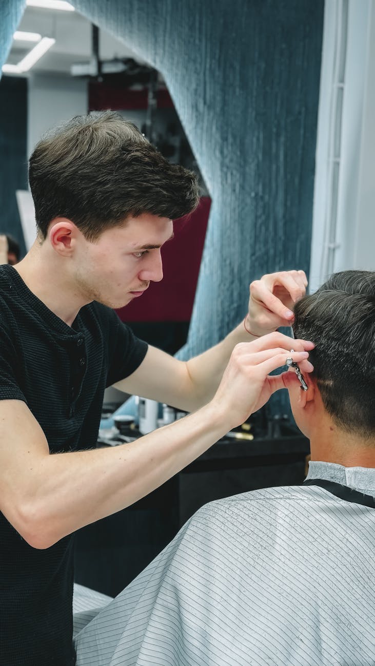Barber working a client